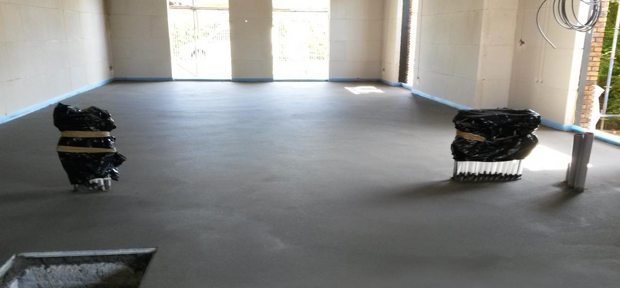 Egaliseren zand/cement dekvloer